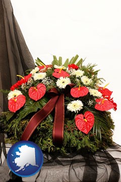 a funeral flower wreath - with Alaska icon