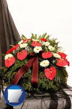 a funeral flower wreath - with Arkansas icon