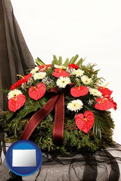 a funeral flower wreath - with Colorado icon