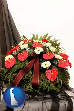 a funeral flower wreath - with Delaware icon