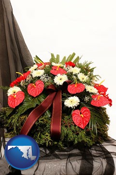 a funeral flower wreath - with Maryland icon