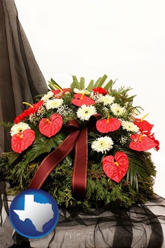 a funeral flower wreath - with Texas icon