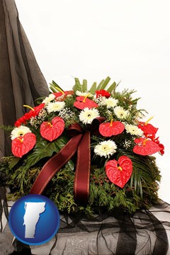a funeral flower wreath - with Vermont icon