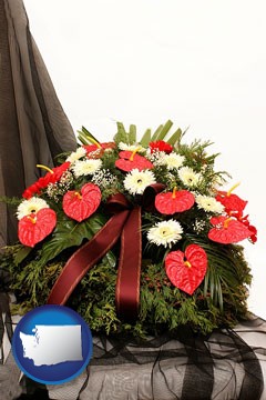 a funeral flower wreath - with Washington icon