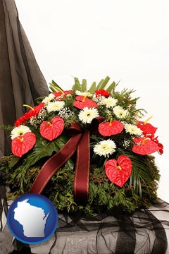 a funeral flower wreath - with Wisconsin icon