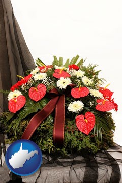 a funeral flower wreath - with West Virginia icon